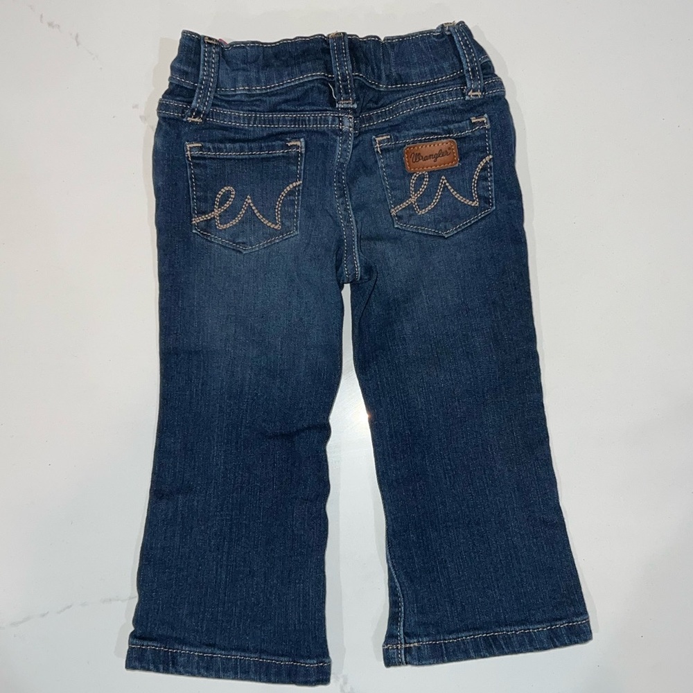 Toddler Boot Cut Wrangler Jeans. Never worn. Adjustable waist.